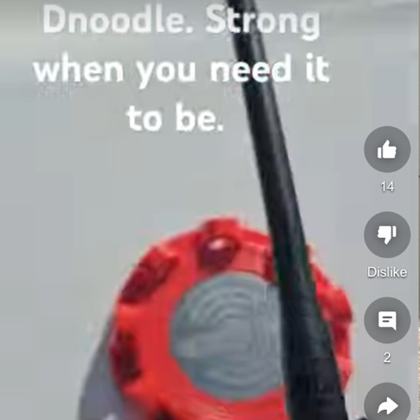 A photo showing the Dnoodle system placed on a desk holding an insulated drink bottle. This setup highlights Dnoodle’s versatility beyond outdoor and marine environments, offering a stable, convenient way to keep drinkware secure in everyday workspaces.