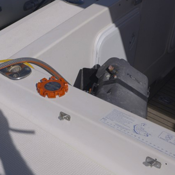 Dnoodle Dock Plate mounted on the gunnel of a boat.