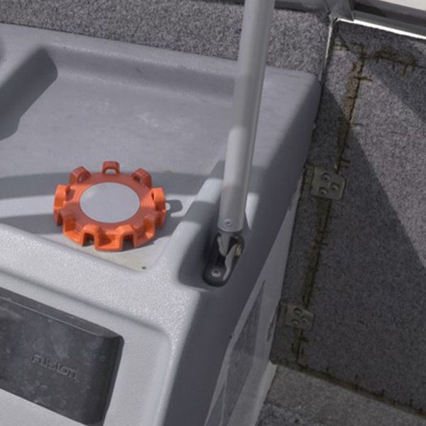 Dnoodle Dock Plate mounted on the dashboard of a boat.